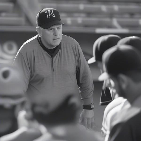 Baseball Manager Discussing Strategy During a Rubber Game