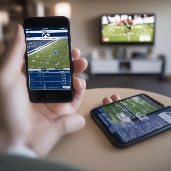 BYU Football Game Schedule on Mobile Phone and TV Screen