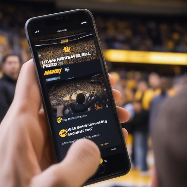 Checking Iowa Hawkeyes Game Information on Smartphone Twitter