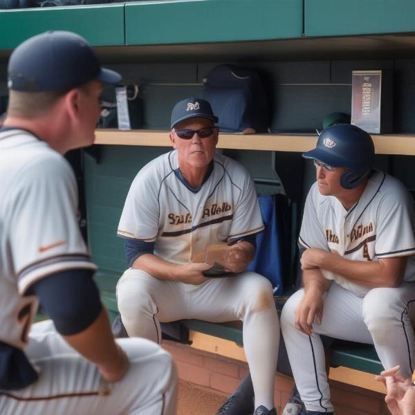 College baseball coach discussing strategies with players