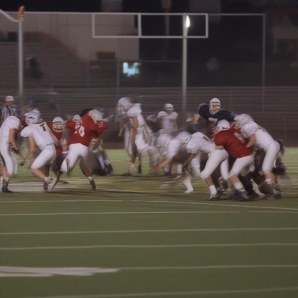 High School Football Game Time - Clock, Players, Field, Spectators