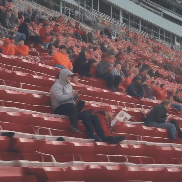 Iowa Northwestern Football Fans Waiting During Game Delay