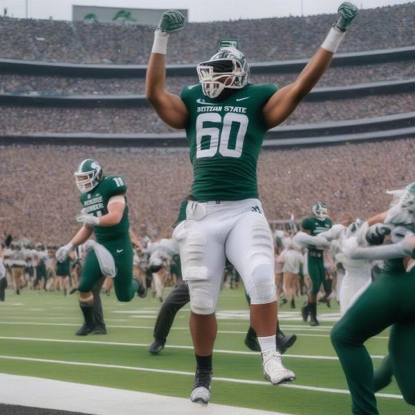 Michigan State Football Team Celebrates a Victory