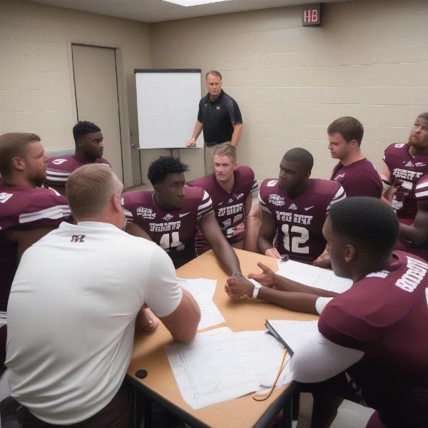 Mississippi State Football Coach Discussing Strategy