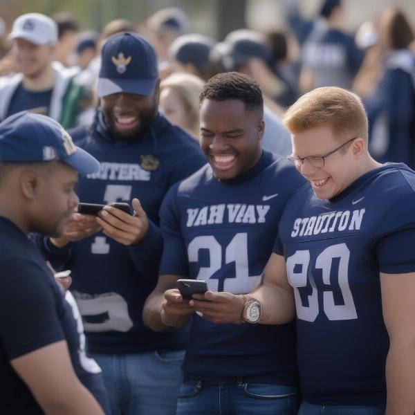 Navy Football Fans Checking Game Time on Their Phones