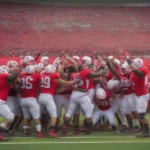 NC State Football Team Celebrates a Victory