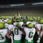 Oregon Ducks Football Team Celebrating a Victory