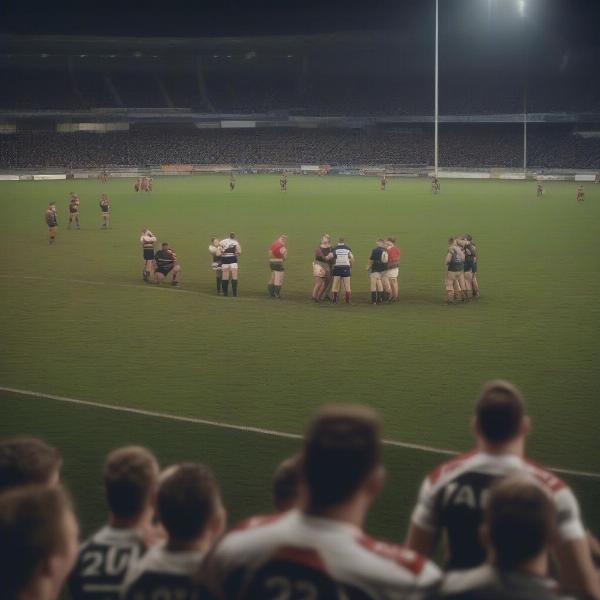 Referee blowing the final whistle at the end of a rugby game