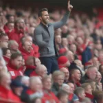 Ryan Reynolds at the Racecourse Ground cheering on Wrexham AFC