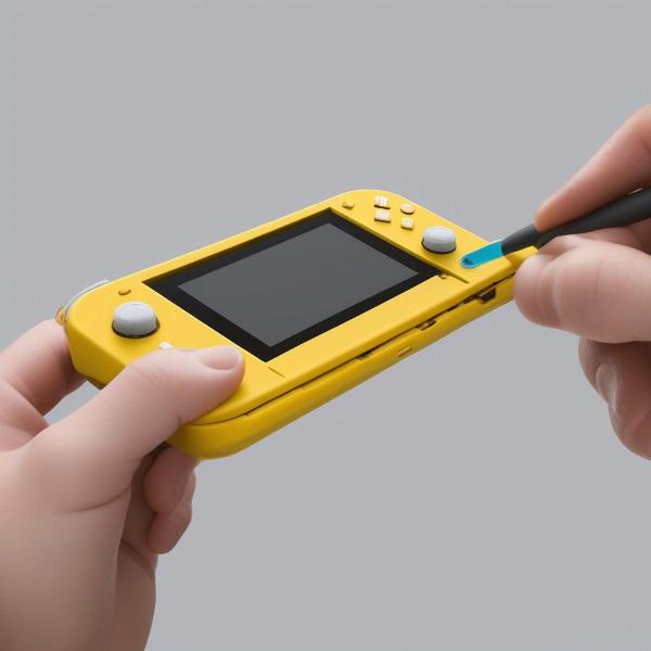 Inserting a Game Cartridge into Nintendo Switch Lite
