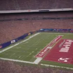 Texas Washington Game Broadcast Team on TV Screen